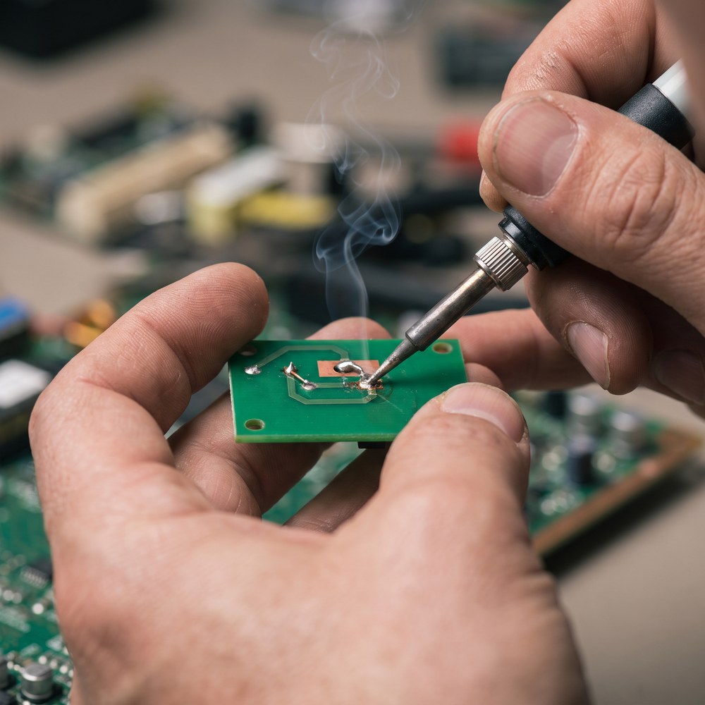 Close-up soldering a component joint
